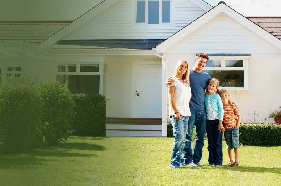 Happy family outside new homeRDS Environmental Colorado