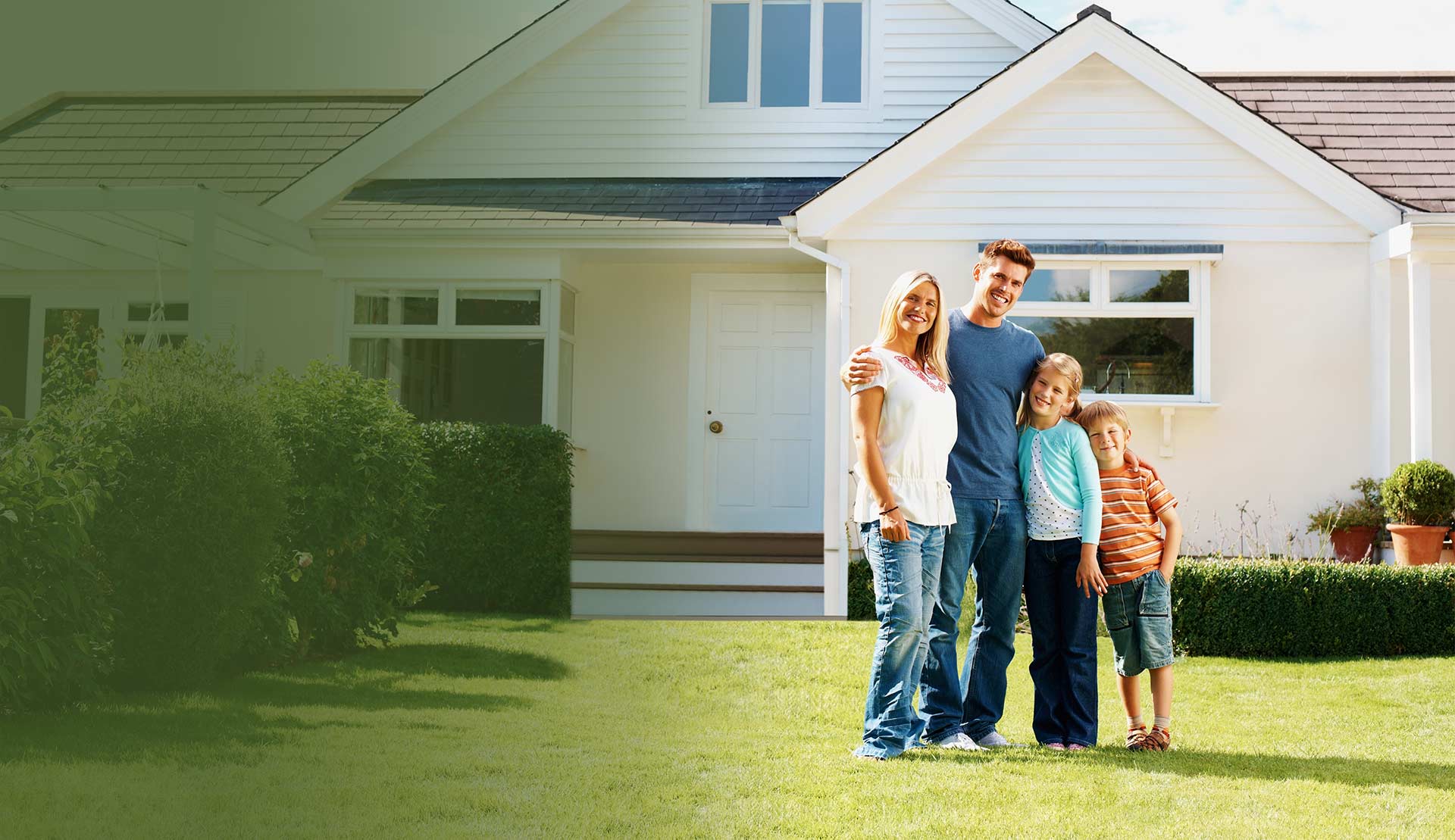 Happy family outside new homeRDS Environmental Colorado